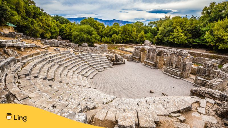 View of the ancient ruins of Butrint, surrounded by lush greenery. - Arranging Travel Plans In Albanian - Ling