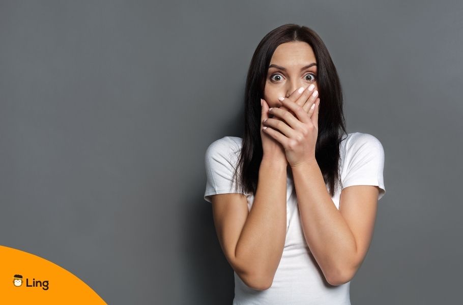 Woman Covering Her Mouth Because She Said A Swear Word