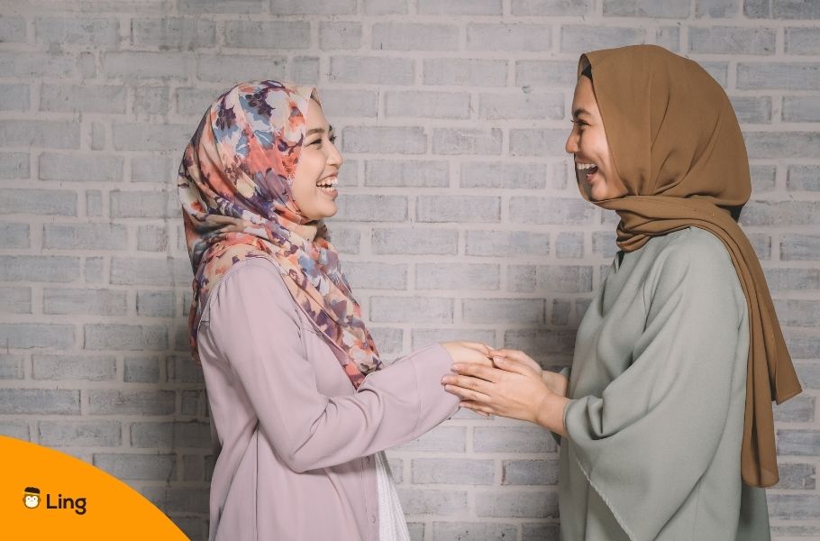 Two Malay Women Greeting Each Other