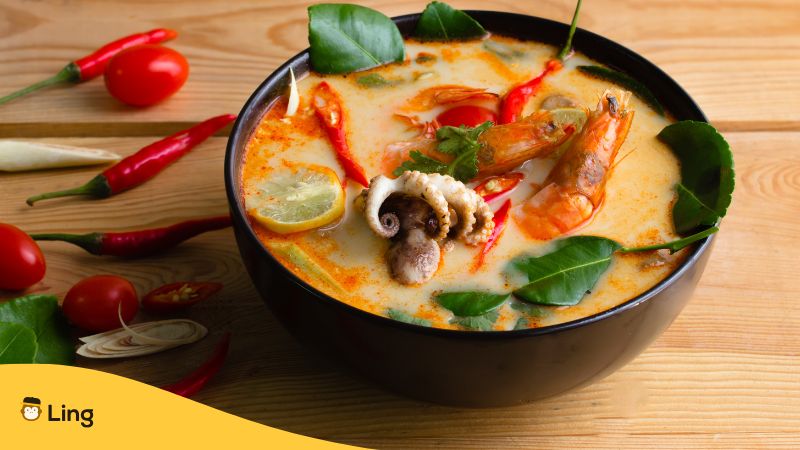 Seafood Tom Yum Goong Served In A Black Bowl