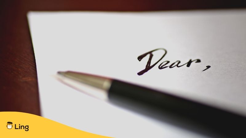 &Quot;Dear&Quot; Written At The Start Of A Letter And A Pen