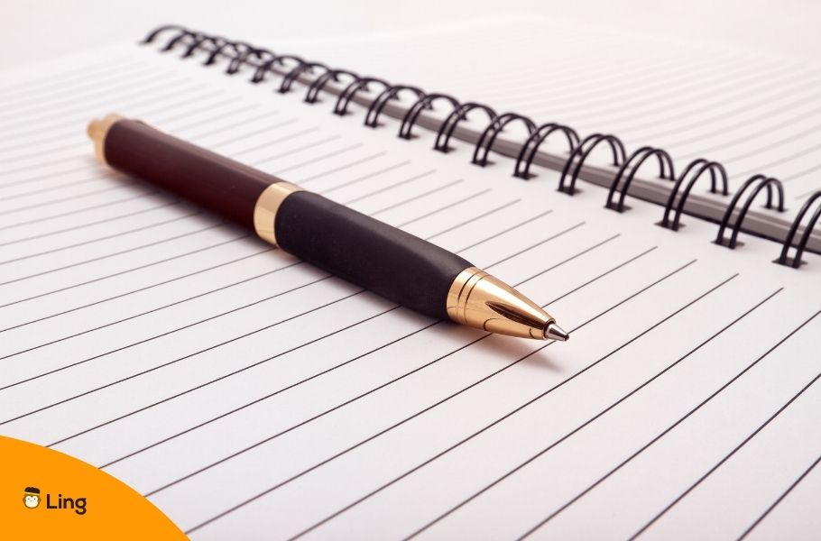 Pen Over A Lined Notebook