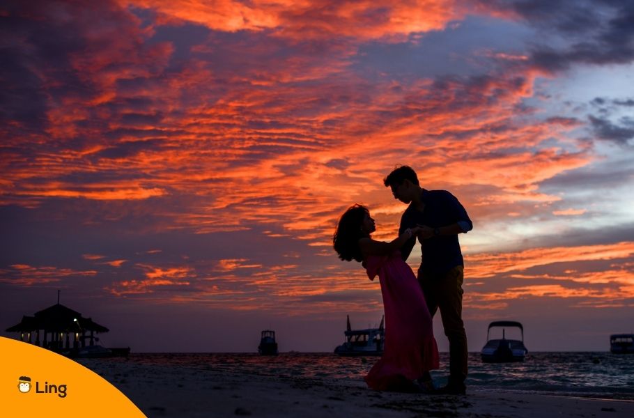Silhouette Of A Dancing Couple At Sunset
