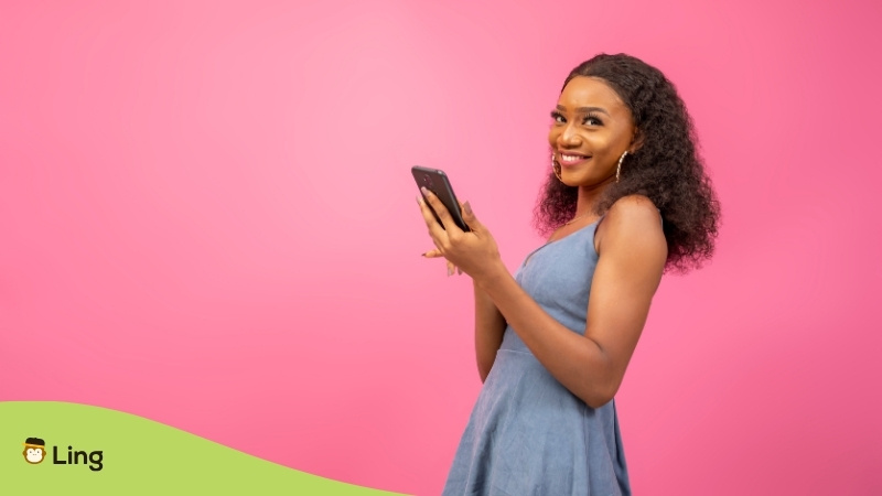 Smiling Woman Holding A Phone