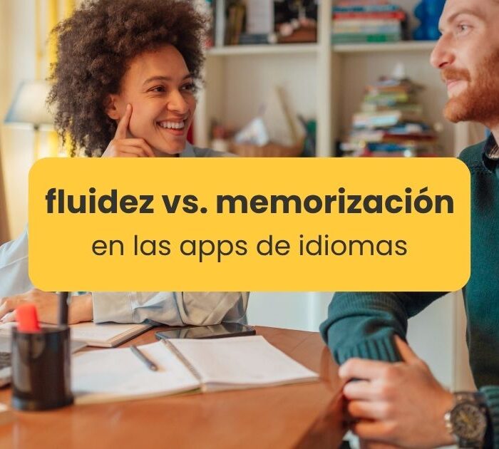 "Fluidez vs. memorización en las apps de idiomas" escrito en un recuadro amarillo con dos personas conversando de fondo