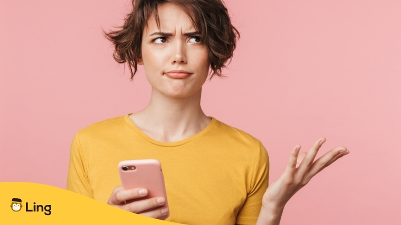 Confused Woman Holding Phone