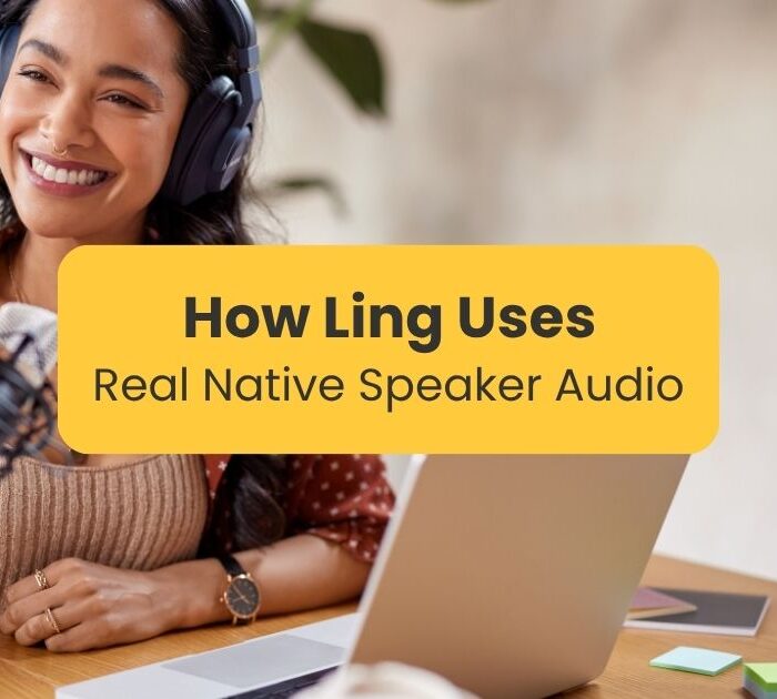Smiling woman with microphone and computer - Ling uses real audio by native speakers