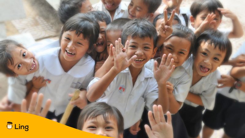 Young School Students Smiling