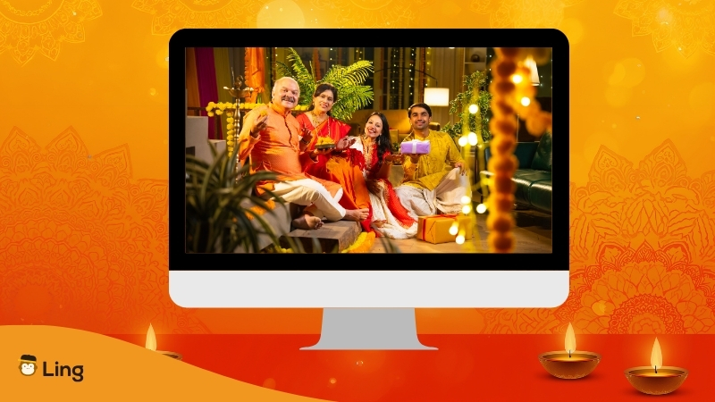 A Digital Screen Showing An Indian Family Celebrating Diwali
