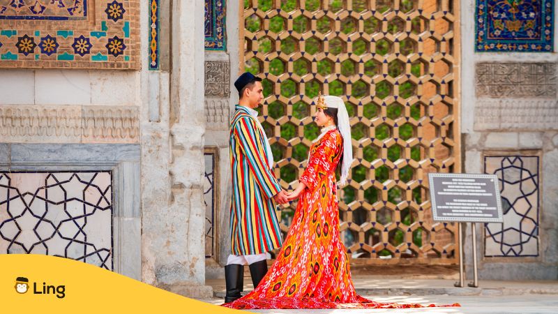 Newly Wedded Couple In Traditional Uzbek Dresses
