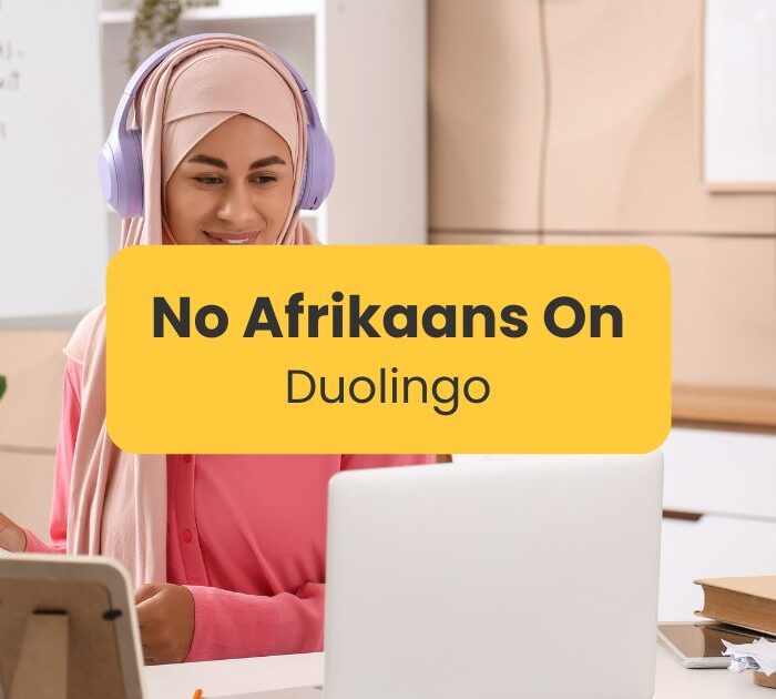 A girl is learning language online - No Afrikaans on Duolingo - Ling app