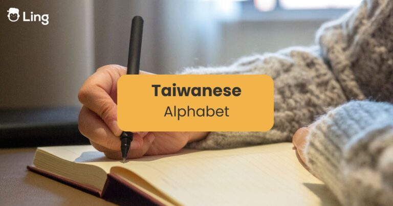 Taiwanese Alphabet - Someone Writing On A Notebook