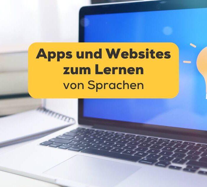 Arbeitsplatz mit offenem Laptop. Entdecke die besten Apps und Websites zum Lernen von Sprachen