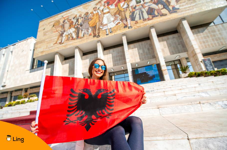Woman Holding Albanian Flag - Learning Albanian For Heritage And Talk With Family