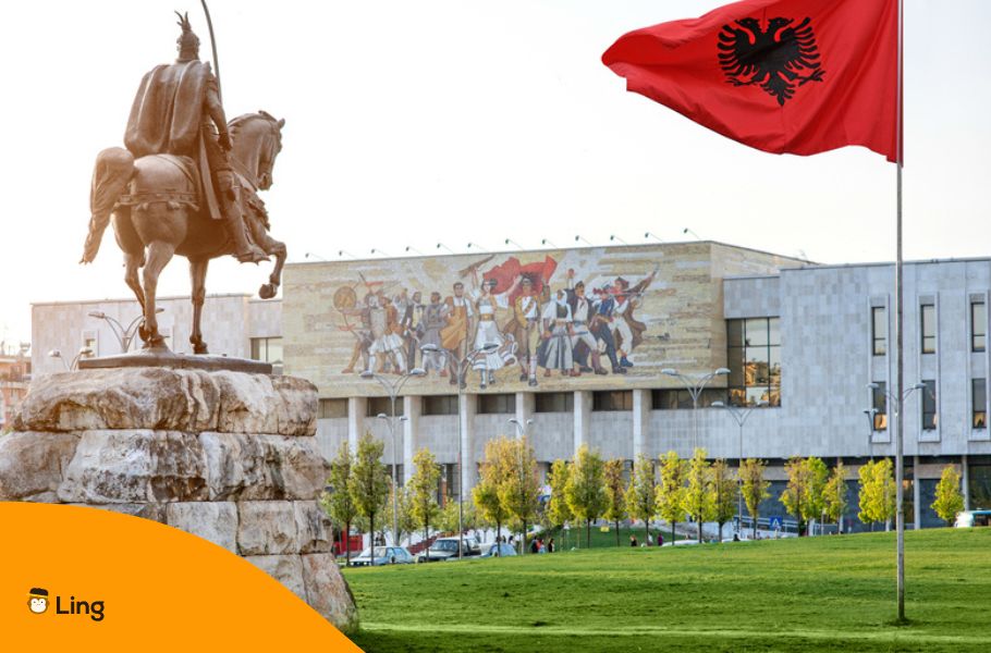 Albanian Statue And Albanian Flag