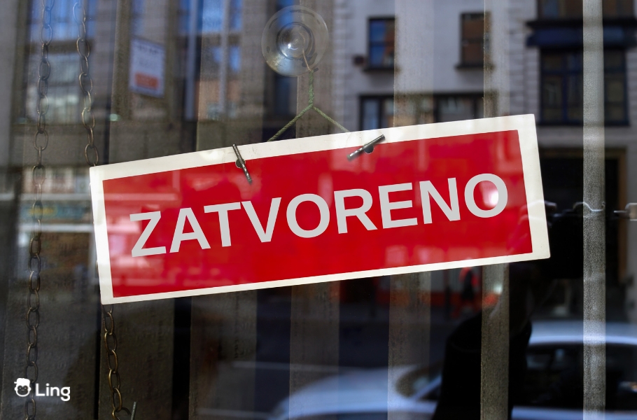 A Closed Sign In Bosnian Hung Outside A Co-Working Space