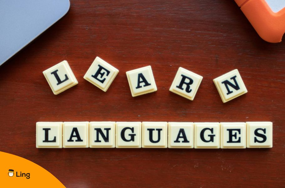 The Words 'Learn Languages' Written With Tiles