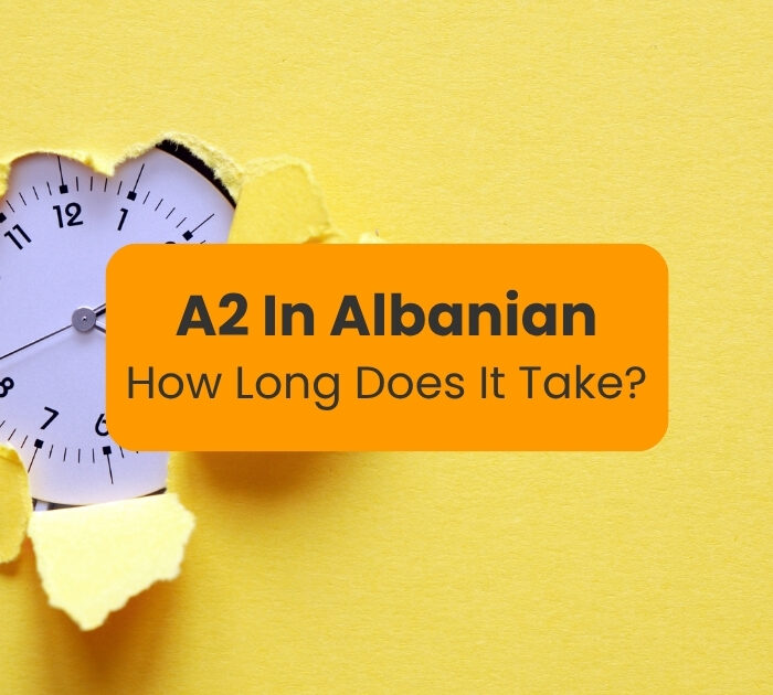 how long does it take to reach A2 in Albanian written against a yellow background and a clock