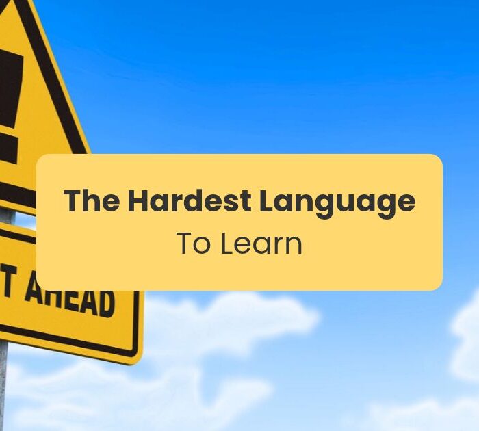 Hardest language to learn- Yellow warning road sign on which it is written difficult ahead
