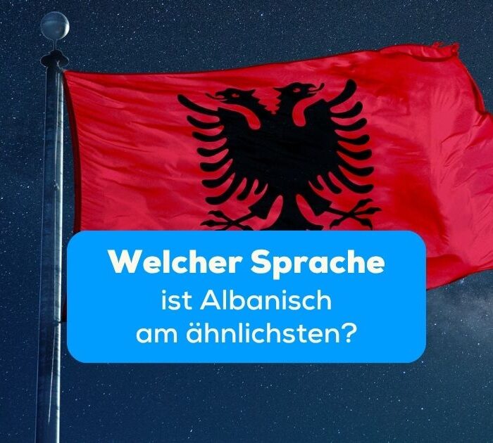 Die albanische Flagge unter dem Sternenhimmel. Erfahre in diesem Artikel, Welcher Sprache ist Albanisch am ähnlichsten?